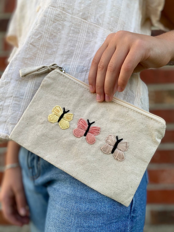 Embroidered wristlet hotsell