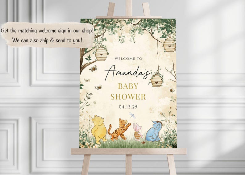 May include: A welcome sign for a baby shower with a Winnie the Pooh theme. The sign features a green and brown woodland background with Winnie the Pooh, Tigger, Piglet, and Eeyore characters. The text on the sign reads "Welcome to Amanda's Baby Shower 04.13.25".