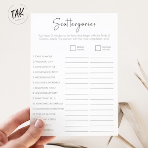 May include: A printable wedding game called "Scattergories" with a list of 13 categories for guests to fill in with words that start with the bride and groom's initials. The game includes two boxes for the bride and groom to initial.