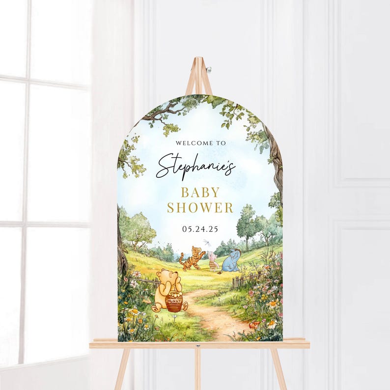 May include: Welcome to Stephanie's Baby Shower sign with a Winnie the Pooh theme. The sign features a whimsical illustration of Winnie the Pooh, Piglet, Tigger, and Eeyore in a forest setting. The date of the shower is 05.24.25.