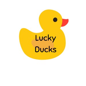 May include: A yellow cartoon duck with a black eye and a red beak. The text "Lucky Ducks" is written in black letters on the duck's body. The background is white.