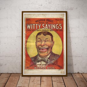 May include: Framed vintage poster titled "Witty Sayings" by Wehman Bros. The poster features a laughing man in a suit and bow tie, set against a red and yellow background. The poster is framed in a brown wooden frame.