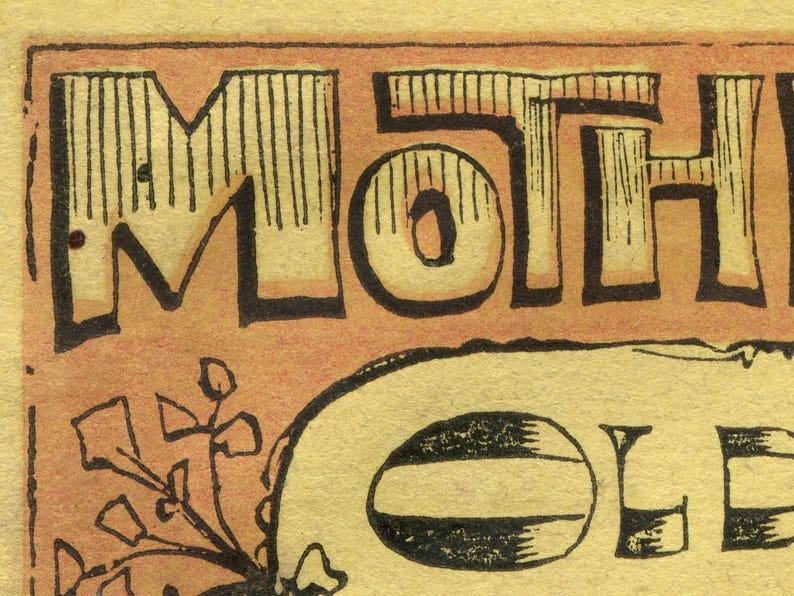 May include: Close-up of a vintage-style illustration with the word "MOTHER" in large, stylized letters. The letters are black with vertical lines inside, set against a peach-colored background. Below, a partial word and floral elements are visible.