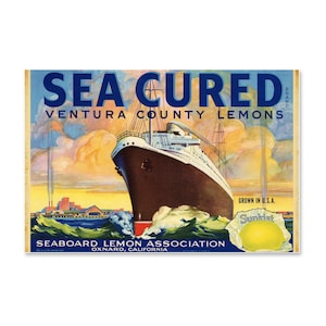 May include: Vintage fruit crate label for Sea Cured Ventura County Lemons. The label features a large ocean liner sailing through waves, with text that reads "Sea Cured" and "Ventura County Lemons." A Sunkist lemon is also shown.