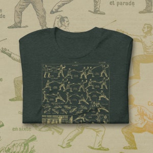 May include: A dark green t-shirt with a vintage illustration of fencing techniques. The illustration includes the words "Fleuret", "Epee", and "Positions de Main".
