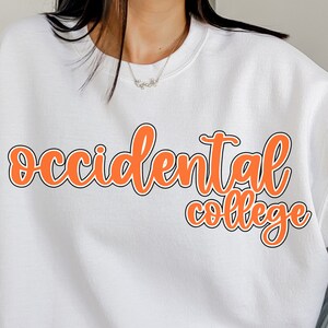 May include: White sweatshirt with the text "Occidental College" in orange lettering with a black outline.