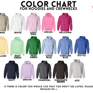 May include: Color chart for hoodies and crewnecks showing 15 different colors, including sand, white, light pink, azalea, heliconia, yellow, mint green, Irish green, light blue, Carolina blue, royal, navy, orchid, charcoal, chocolate brown, and ash.