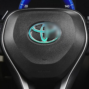 T Steering Wheel Opal Chrome Overlay. 2009+ Models.