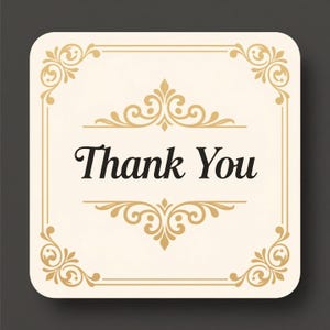 May include: A cream-coloured square card with the words "Thank You" in black script. The card has gold decorative flourishes in the corners and along the top and bottom edges, set against a dark grey background.