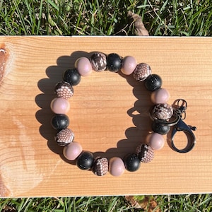 Pulsera con estampado de serpiente, cuentas de silicona con purpurina, cuentas de silicona con motas negras, llavero de pulsera, llavero de pulsera