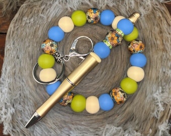 Ensemble bracelet et stylo fleurs bohèmes en silicone