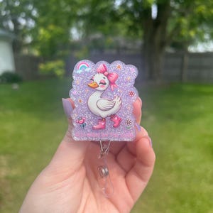 Silly Goose on the Loose badgehaspel verwisselbaar, roze glitter badgehaspel, gans badgehaspel, strikken en bloemen badgehaspel