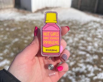 Les filles chaudes ont des problèmes d'estomac, enrouleur interchangeable drôle de badge scintillant