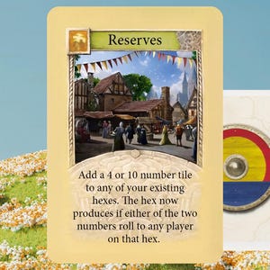May include: A game card labeled "Reserves" with an illustration of a medieval town scene. Text on the card explains game mechanics. A second card with a shield design is partially visible. The background is a field of flowers under a blue sky.