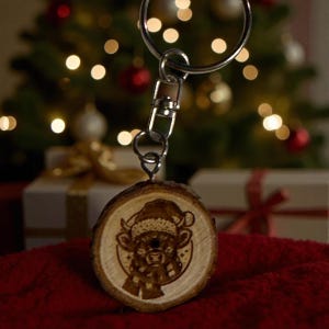 highland cow in Christmas hat keychain