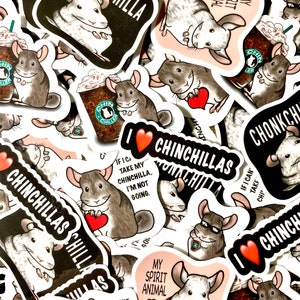 May include: A collection of colorful stickers featuring chinchillas with various designs and phrases. Some stickers feature chinchillas with hearts, coffee cups, and sunglasses. The text on the stickers includes "My Spirit Animal", "If I can't take my chinchilla, I'm not going", and "Chinchillas Chilla".