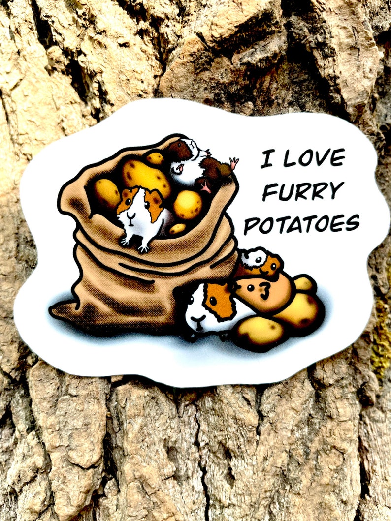 May include: A brown burlap sack filled with guinea pigs and potatoes. The text "I love furry potatoes" is printed on a white background.
