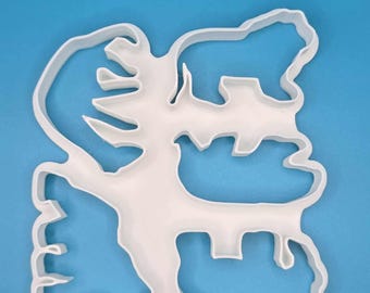 May include: White plastic cookie cutter shaped like a family of bears. The cutter has a large bear in the center with two smaller bears on either side.