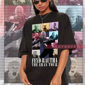 May include: Black unisex t-shirt featuring a graphic of a character from a film, with multiple images in a grid. The text "FEYD-RAUTHA THE ERAS TOUR" is printed below the grid.