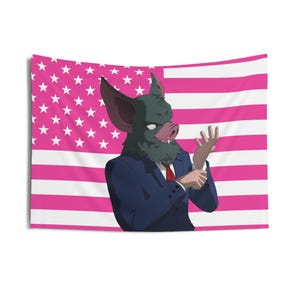 May include: A wall hanging depicting a bat-like figure in a suit and tie, set against a pink and white American flag. The creature has a dark green face, large ears, and a pink snout. The flag's stars are white, and the stripes are pink.