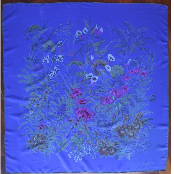 Gianni Versace vintage silk scarf with a floral composition on electric blue background 33 1/2” x 34 1/4” (85 x 87cm)