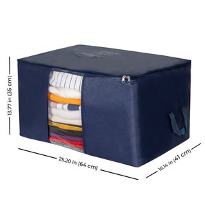 May include: A navy blue storage bag with a zipper closure and a handle. The bag is 25.20 inches wide, 16.14 inches deep, and 13.77 inches tall. The bag is made of a durable fabric and is perfect for storing clothes, blankets, or other items.