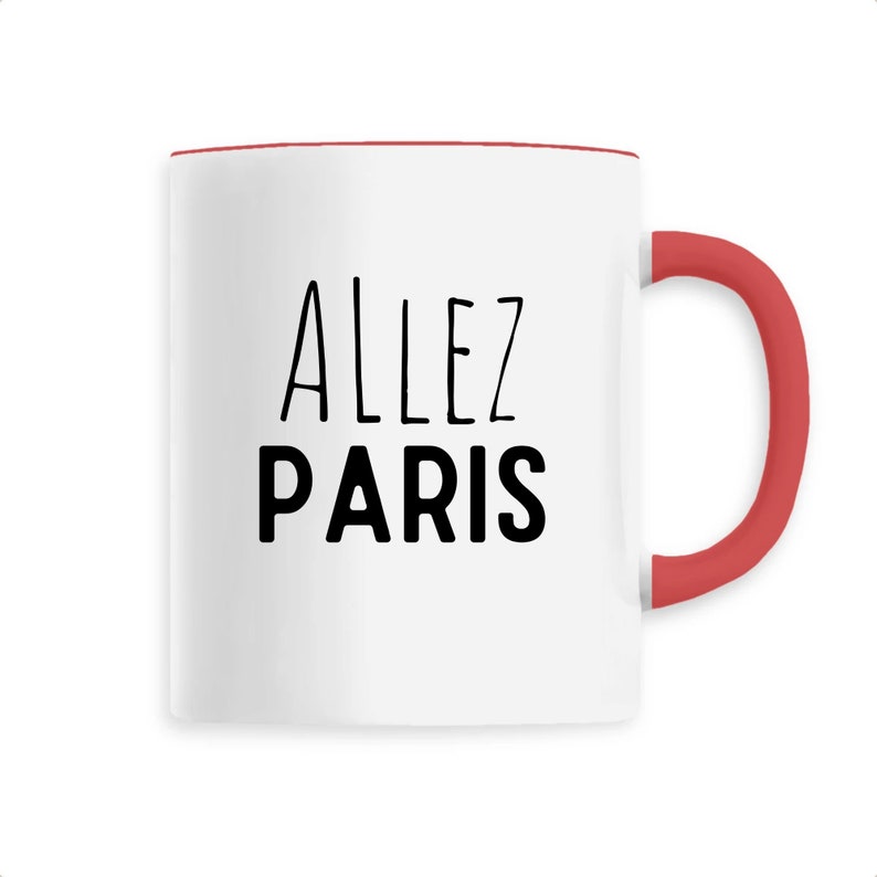 May include: White ceramic mug with a red handle and rim. The mug features the words "ALLEZ PARIS" in black, a phrase often associated with Paris, France. A simple, yet stylish design.