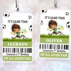 May include: Two clear plastic VIP passes with green lanyards. Each pass features a soccer-themed illustration with the text "IT'S GAME TIME". One pass says "JACKSON" and the other says "OLIVER". Both passes include "Cameron's 7th Birthday" and "VIP ALL ACCESS PASS".