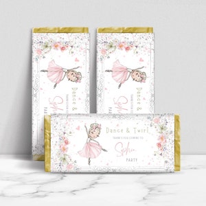 May include: Three pink and gold chocolate bar wrappers with a ballerina illustration and the text "Dance & Twirl" and "Thank you for coming to Sophia's Party".
