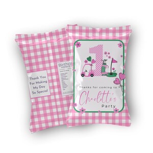 May include: Pink and green party favour bags with a gingham pattern. The front of the bag features a cartoon illustration of a girl in a golf cart with the number one and the text "Thanks for coming to Charlotte's Party".