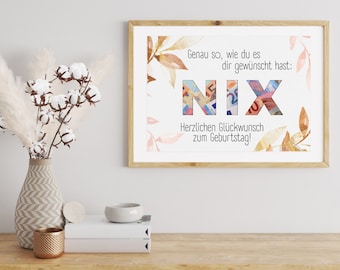 May include: A framed print with a birthday message that says "Genau so, wie du es dir gewünscht hast: NIX Herzlichen Glückwunsch zum Geburtstag!" The letters are made of euro bills and the background is a watercolor design with leaves in shades of pink and orange.