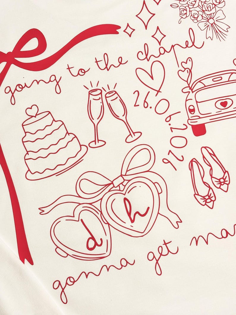 May include: Cream-colored fabric with a red line drawing of wedding-themed elements. Includes a tiered cake, champagne glasses, a car, shoes, hearts, and the text "going to the chapel" and "gonna get married".