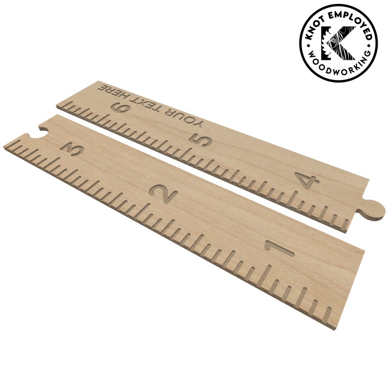 May include: Two wooden rulers with engraved markings and numbers. The rulers are light brown and feature the text "YOUR TEXT HERE" near the top. One ruler has a notch and a rounded end. The rulers are designed for woodworking.