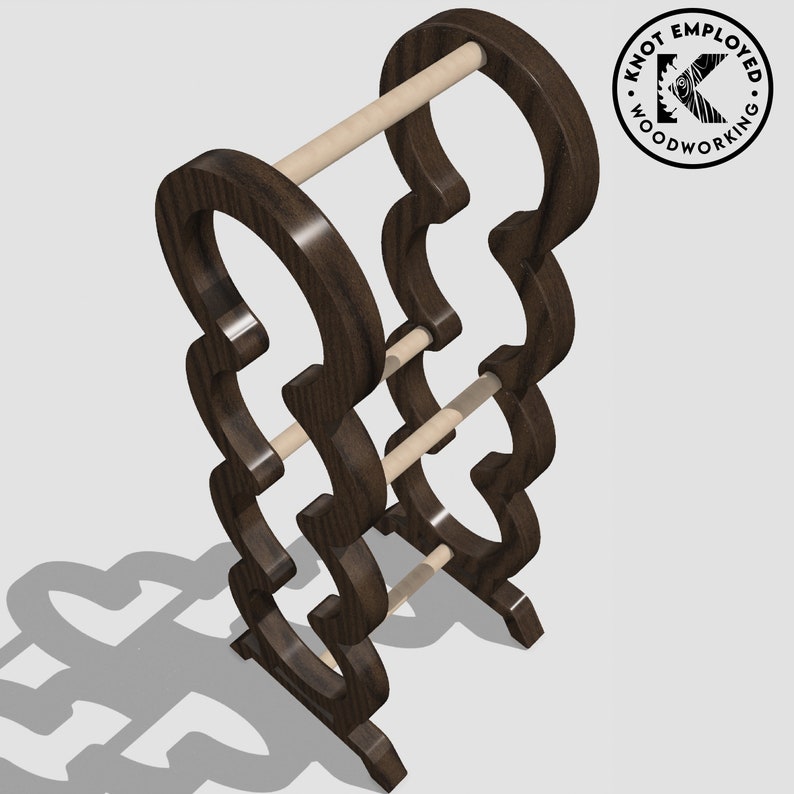 May include: A dark brown wooden towel rack with three tiers and a decorative design. The rack has a rustic look and is made of solid wood.