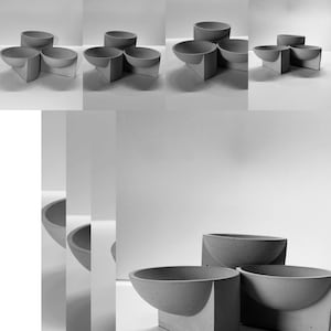 May include: A collection of grey concrete bowls with a contemporary, geometric design. Each bowl is supported by a triangular or rectangular base, creating a minimalist aesthetic. The bowls are arranged in various compositions, showcasing their versatility.