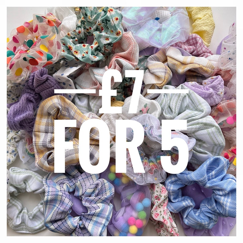 May include: A collection of colorful hair scrunchies in various patterns and textures, including plaid, floral, and polka dots. The scrunchies are arranged in a pile and the text "&pound;7 FOR 5" is superimposed on the image.