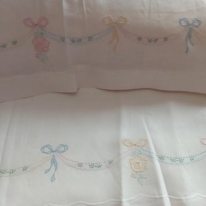 Hand embroidered linen double bed sheet with bows