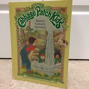 May include: A set of three ceramic mugs with a speckled, matte finish. The mugs are in shades of cream, light gray, and dark gray. Each mug has a simple, minimalist design, perfect for coffee or tea.