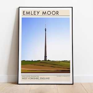 May include: A minimalist poster with a black frame featuring a graphic illustration of the Emley Moor Transmitter, a tall, red and white tower, against a blue sky. The text "Emley Moor" is at the top of the poster, and the text "Emley Moor Transmitter, West Yorkshire, England" is at the bottom.
