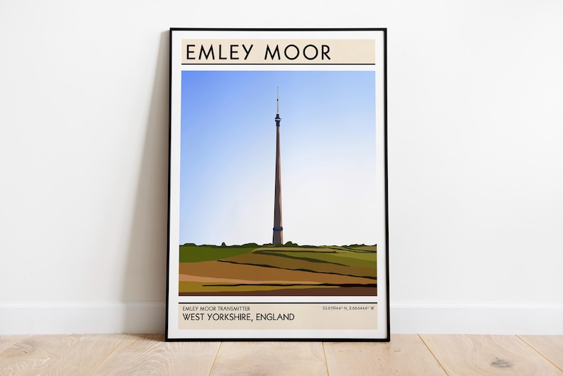 May include: A minimalist poster with a black frame featuring a graphic illustration of the Emley Moor Transmitter, a tall, red and white tower, against a blue sky. The text "Emley Moor" is at the top of the poster, and the text "Emley Moor Transmitter, West Yorkshire, England" is at the bottom.
