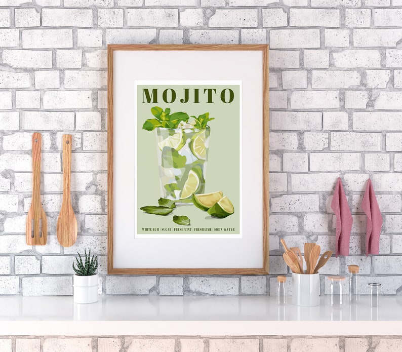 May include: A vintage-style poster with the word "MOJITO" in green text. The poster features a green and white illustration of a mojito cocktail in a tall glass with lime wedges and mint leaves. The text "WHITE RUM, SUGAR, FRESH MINT, FRESH LIME, SODA WATER" is printed below the illustration.