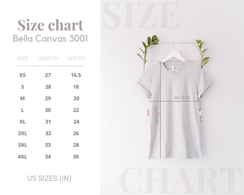 May include: A light gray Bella Canvas 3001 t-shirt hanging on a white hanger, with a size chart to the left. The chart shows measurements in inches for sizes XS to 4XL. The shirt's length and width are indicated with lines.