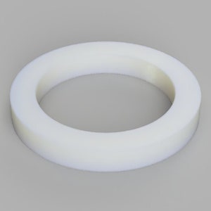 Può includere: Un anello di plastica bianco con una superficie liscia.