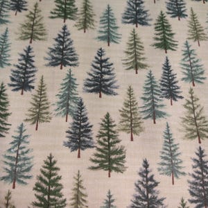 May include: A beige fabric with a repeating pattern of dark green and blue pine trees. The trees are stylised and have a watercolour effect.
