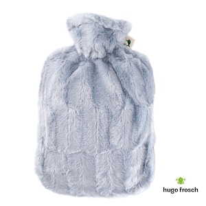 May include: A light blue plush hot water bottle with a quilted design. The bottle has a fabric cover and a label that says "hugo Frosch".