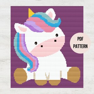 May include: A crochet pattern for a cute unicorn with a rainbow mane and horn. The unicorn is sitting on a purple background with the words "PDF PATTERN" in a circle.