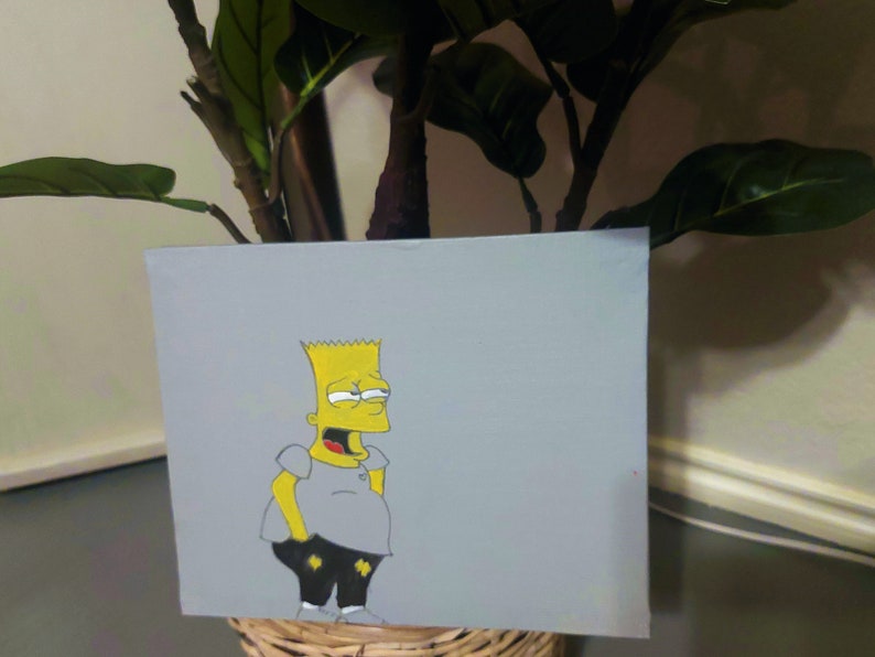 May include: A hand-painted canvas featuring a cartoon illustration of Bart Simpson from The Simpsons. Bart is depicted in a grey shirt, black pants, and yellow skin. The background is a light grey.