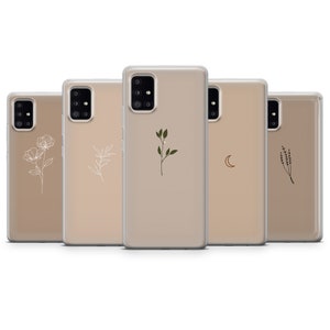 May include: Five clear phone cases with different minimalist designs. The designs include a flower, leaves, a crescent moon, and a sprig of lavender.