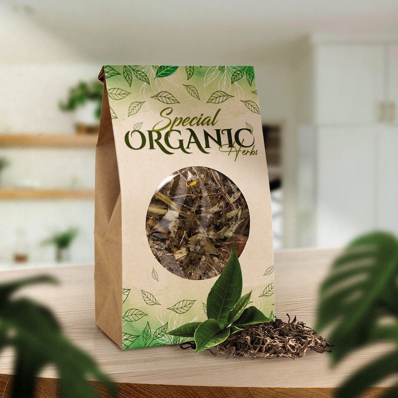 May include: A brown paper bag of organic herbs with a clear circular window. The bag has green leaf designs and the words "Special Organic Herbs". A small pile of dried herbs and green leaves are in front of the bag.