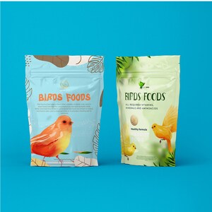 May include: Two bags of bird food are displayed against a blue background. The left bag is light blue with a red and orange bird illustration and the text "BIRDS FOODS". The right bag is green with a yellow bird illustration and the text "BIRDS FOODS".